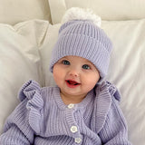 BABY GIRL WARING BEANIE
