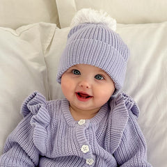 BABY GIRL WARING BEANIE