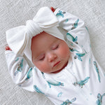 warm white jacquard knit bow stretch with elastane and cotton