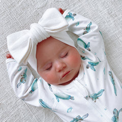 warm white jacquard knit bow stretch with elastane and cotton