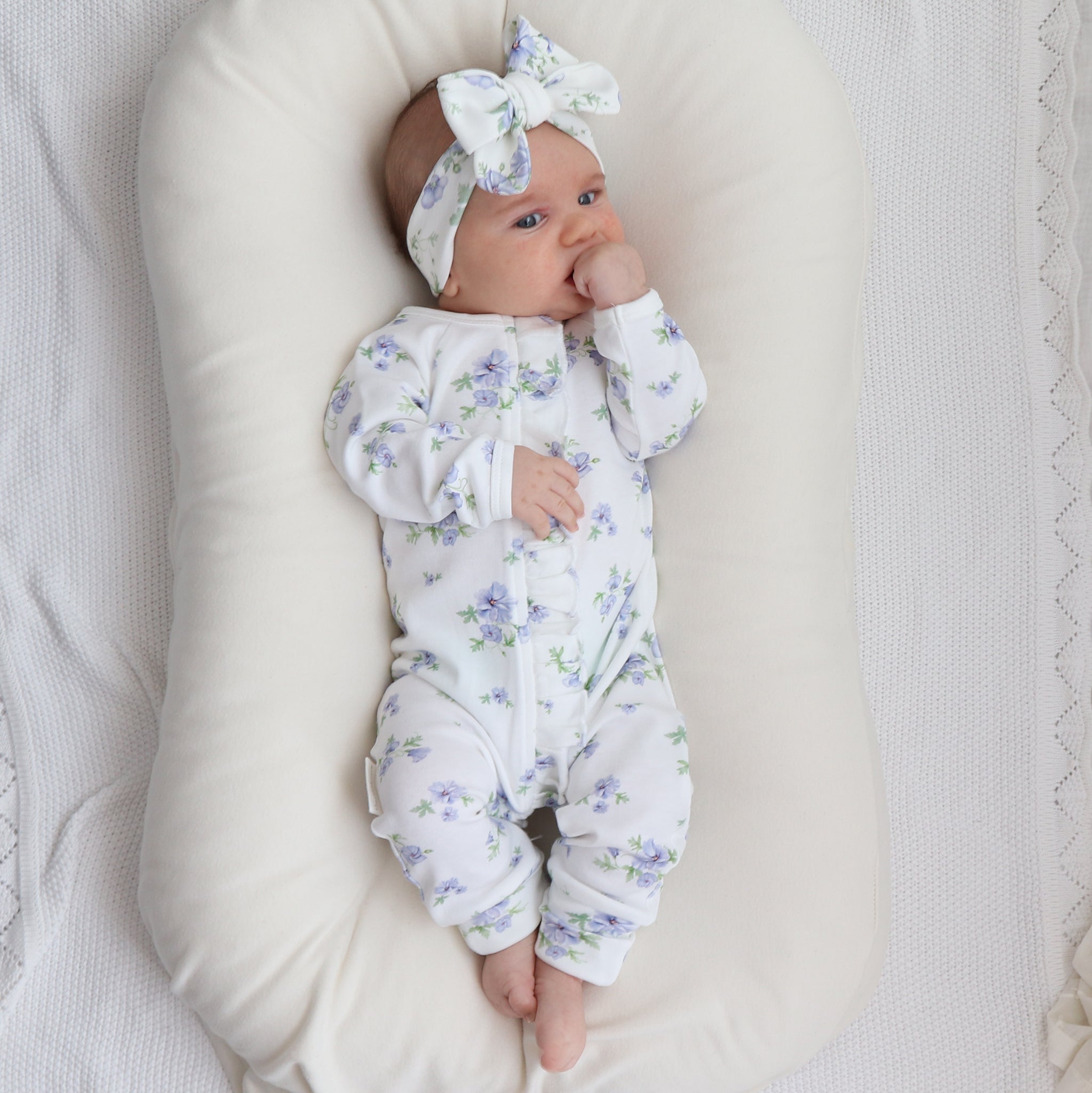 hibiscus-posie-frilly-onesie with matching bow