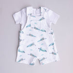 white t-shirt matched with ocean turtle overalls
