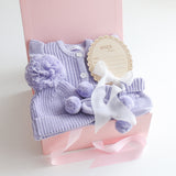Baby Gift Set – Lavender Knit Romper, Booties, Beanie & Disc She's Here, White Ribbon