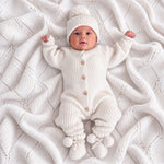 Warm White knitted baby romper by Thea With Love