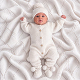 Warm White knitted baby romper by Thea With Love