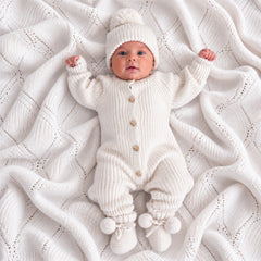 Warm White knitted baby romper by Thea With Love