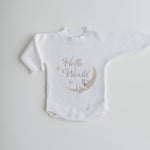 koala-hello-world-embroidered-on centre front in soft golden yarn. Koala is sleeping on the moon. He has the cutest face