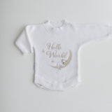 koala-hello-world-embroidered-on centre front in soft golden yarn. Koala is sleeping on the moon. He has the cutest face