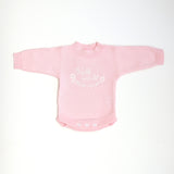 heirloom romper pretty pink hello world clearance white embroidery text hello world with flowers in a circle underneath flowers 5 petals and pink centre