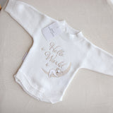 Flatlay of the Hello World Koala romper showing the embroidery imperfection — the koala’s face appears untidy with a slightly larger nose.