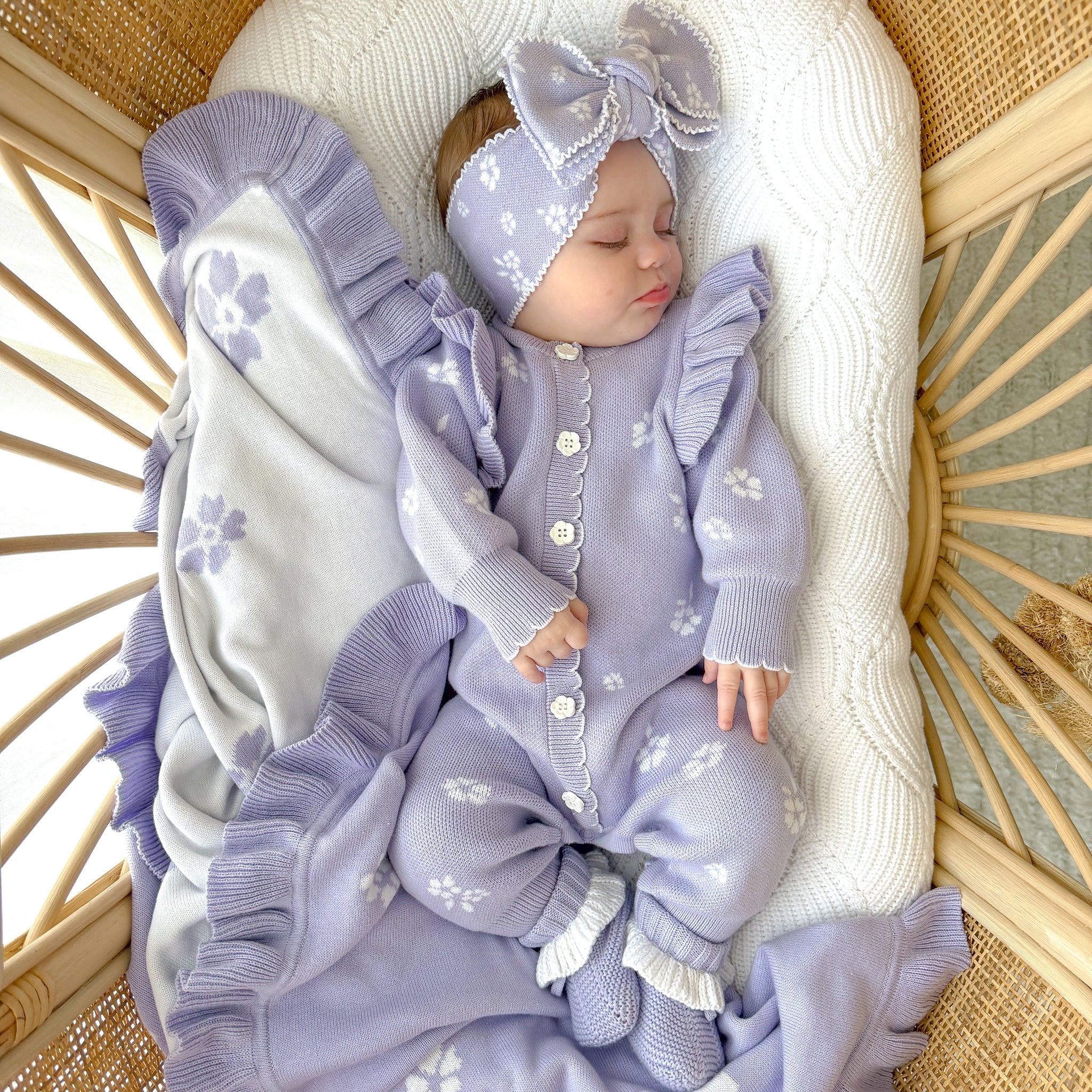 Lavender Posy jacquard knitted baby romper by Thea With Love