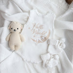 Our koala hello world summer features a baby koala sleeping on eclipse shape  moon. 2 stars are also added. The embroidery is running writing. The embroidery yarn is glossy so the hello world shines in the sunlight. Romper is white knitted fabric. short sleeves and legs for summer. 