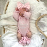 Pretty Pink Hello World Bundle With Bow. The embroidery hello world is in white yarn and it is placed in the centre of romper chest area so it is clearly seen in your announcement photos match with bow and booties