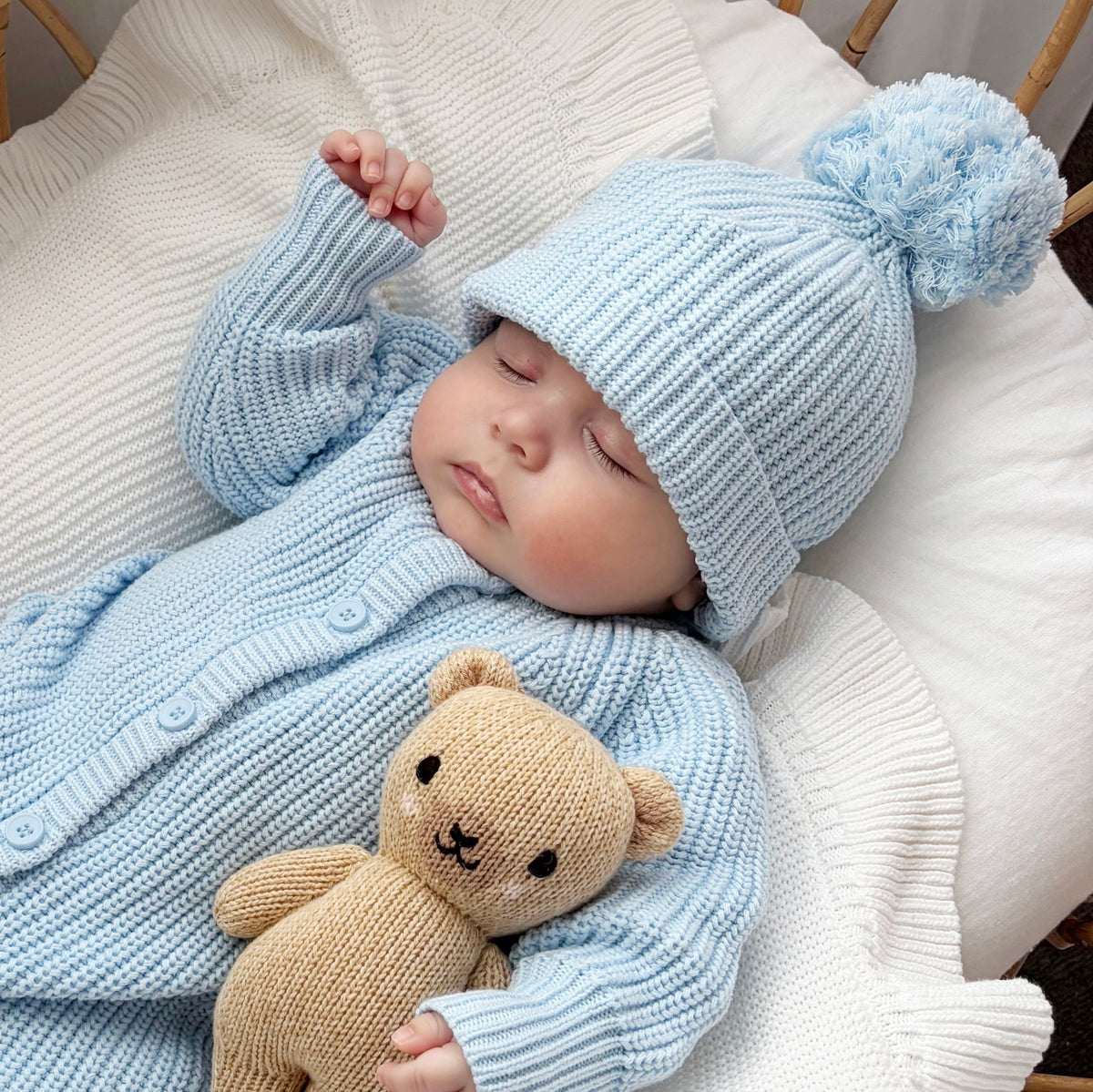 Baby Blue knitted pom pom baby beanie by Thea With Love