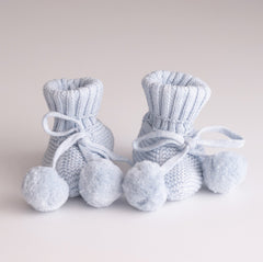 sky booties with pom pom