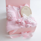 Baby Gift Set – Pretty Pink Frill Knit Romper, Booties, Beanie & Disc She's Here, White Ribbon