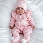 frilly-pretty-pink-romper-baby girl 5 months old with matching cute booties and beanie