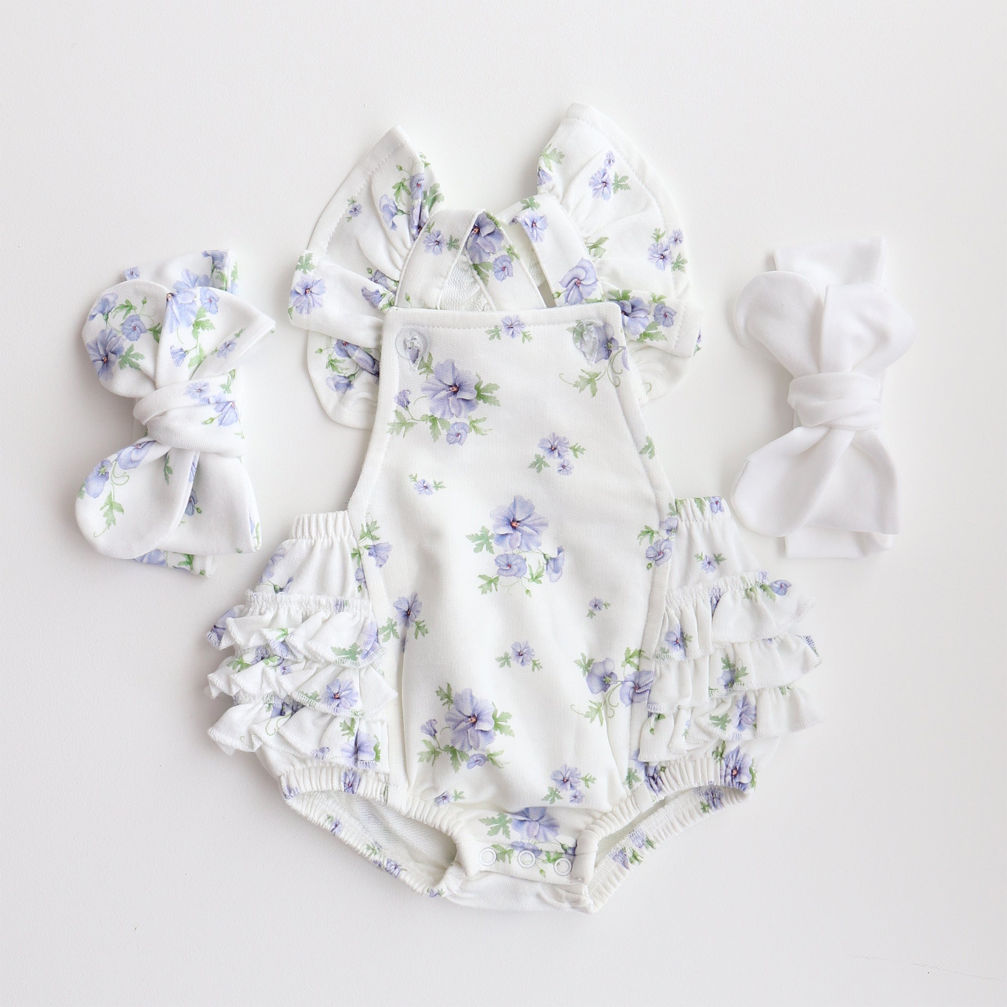 hibiscus posie ruffle playsuit with matching bows white and hibiscus posie
