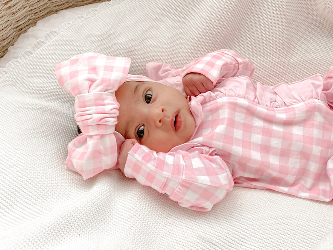 pink gingham frilly onesie