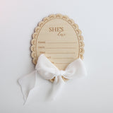 Baby Gift Set –Milky Coffee Romper, Booties, Bow, Disc She's Here, White Ribbon