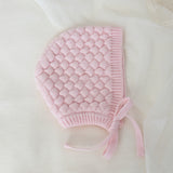 baby bonnet flatlay