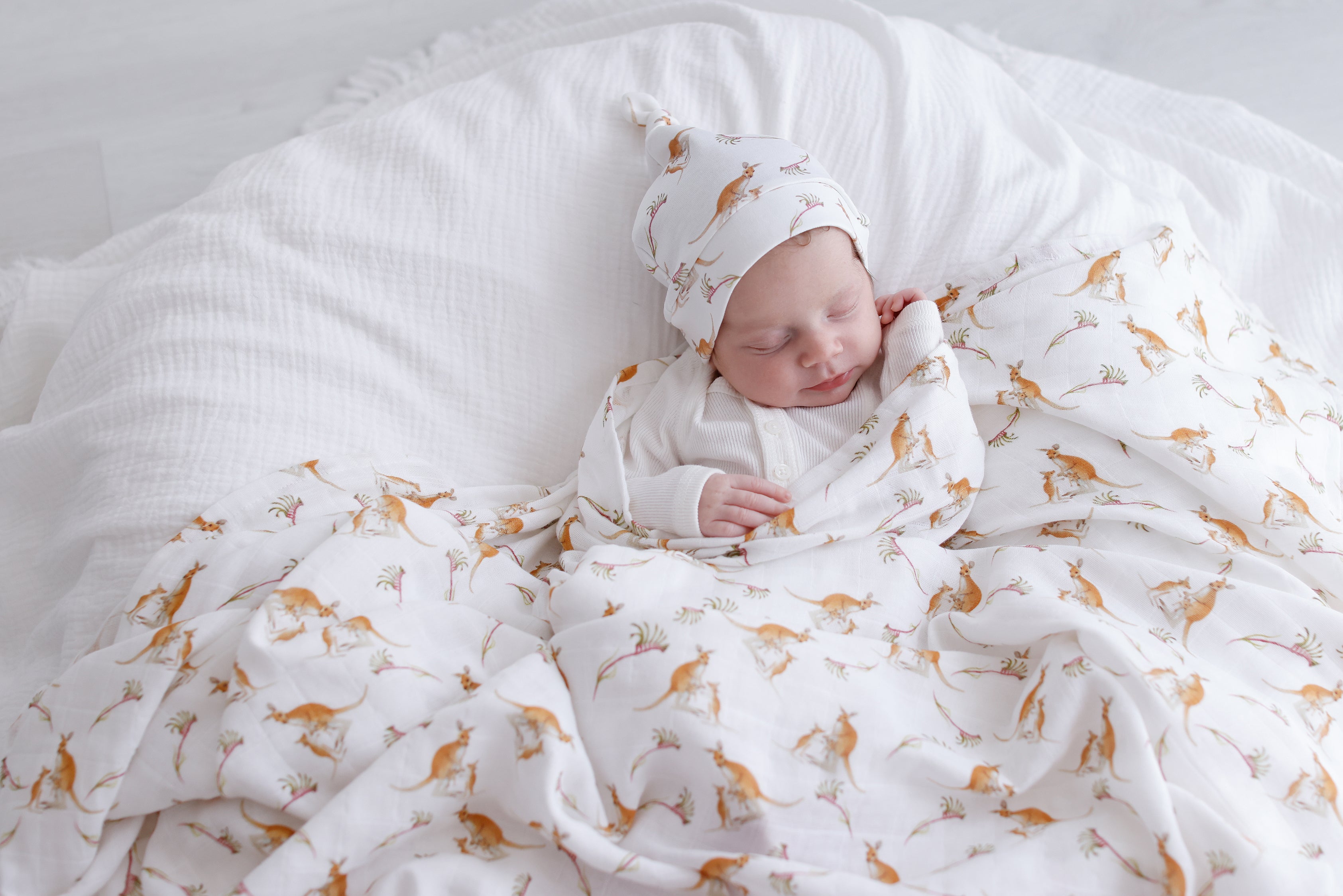 kangaroo-paw-muslin swaddles and matching beanie